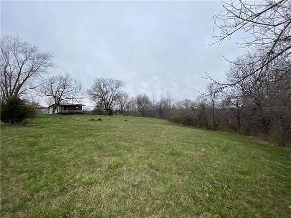 3.82 Acres of Residential Land with Home for Sale in Excelsior Springs, Missouri