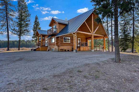 16.6 Acres of Land with Home for Sale in Elk, Washington