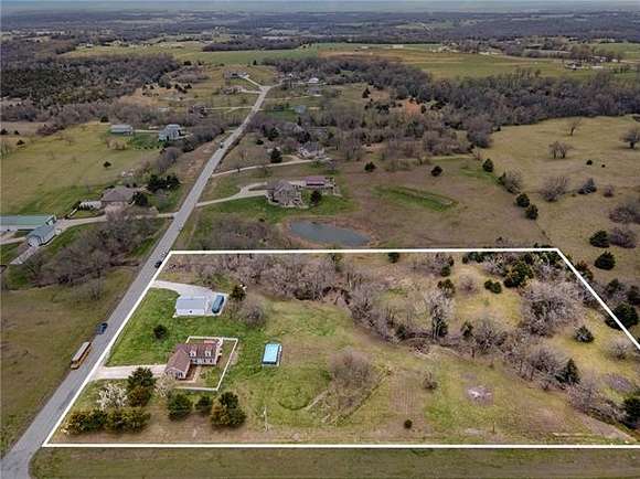 5.2 Acres of Residential Land with Home for Sale in Paola, Kansas