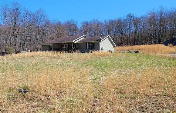 2.4 Acres of Residential Land with Home for Sale in Piketon, Ohio