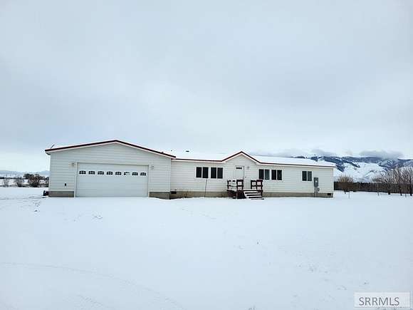 6.6 Acres of Residential Land with Home for Sale in Howe, Idaho
