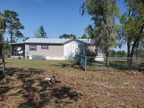 8.6 Acres of Residential Land with Home for Sale in Dunnellon, Florida
