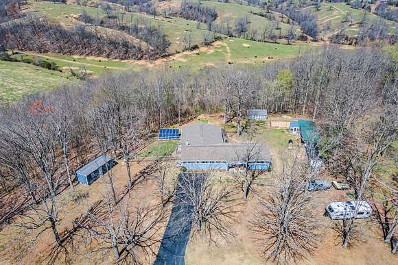 5.3 Acres of Residential Land with Home for Sale in Erin, Tennessee