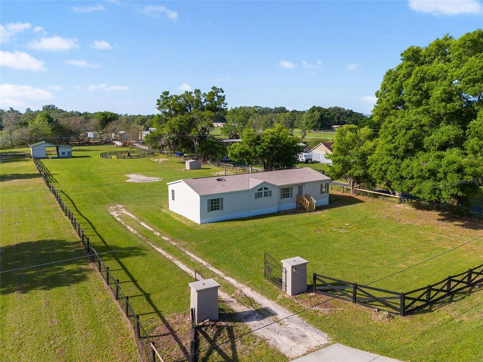 3 Acres of Residential Land with Home for Sale in Summerfield, Florida