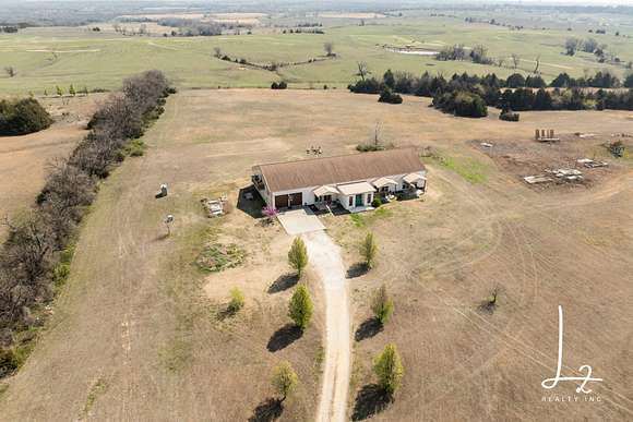 75 Acres of Recreational Land with Home for Sale in Independence, Kansas