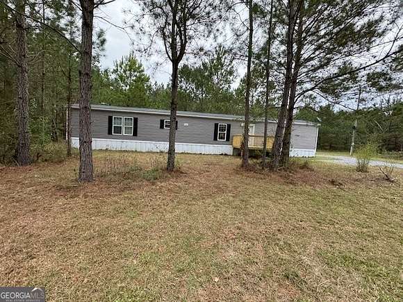 3 Acres of Residential Land with Home for Sale in Pelham, Georgia
