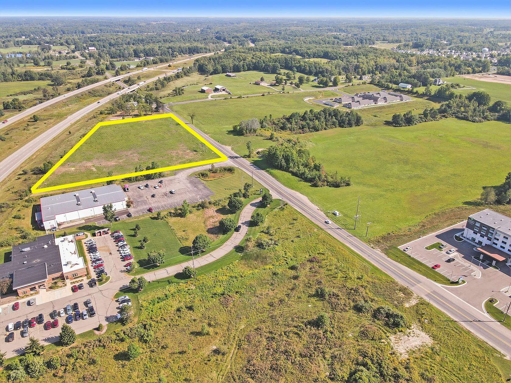 5.5 Acres of Commercial Land for Sale in Cedar Springs, Michigan