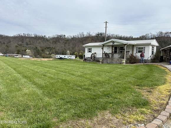 1.1 Acres of Residential Land with Home for Sale in Maynardville, Tennessee