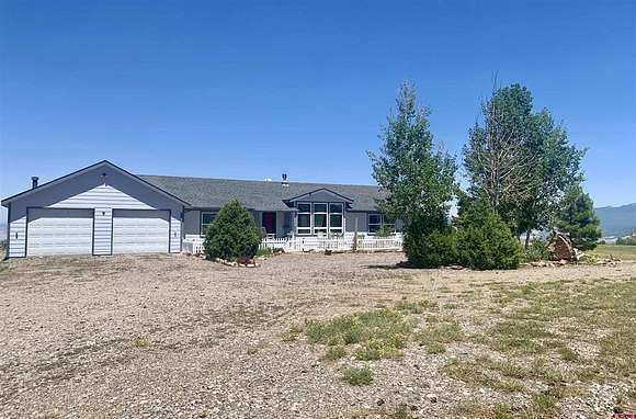46.8 Acres of Recreational Land with Home for Sale in Montrose, Colorado