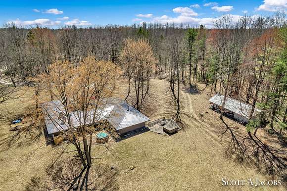 842 Acres of Land with Home for Sale in Sears, Michigan