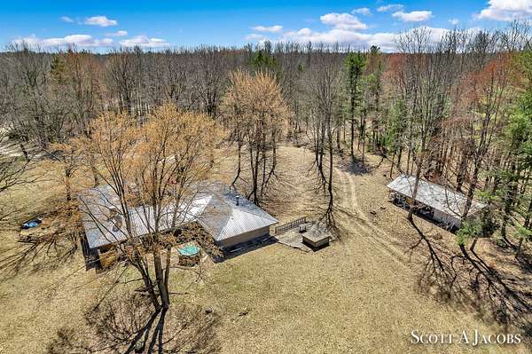 842 Acres of Land with Home for Sale in Sears, Michigan