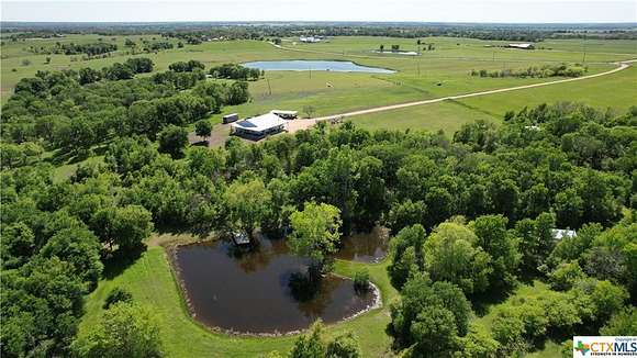 41.1 Acres of Agricultural Land with Home for Sale in Rogers, Texas