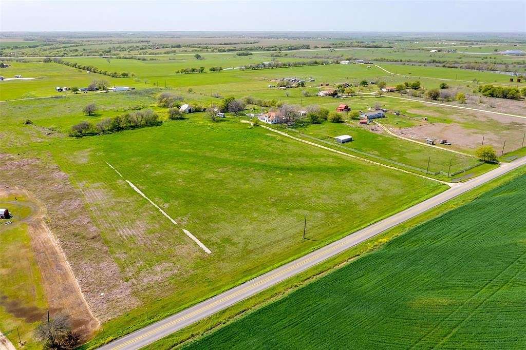 12.2 Acres of Land with Home for Sale in Grandview, Texas