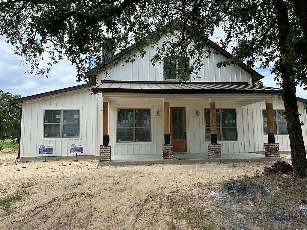 2 Acres of Residential Land with Home for Sale in Poolville, Texas