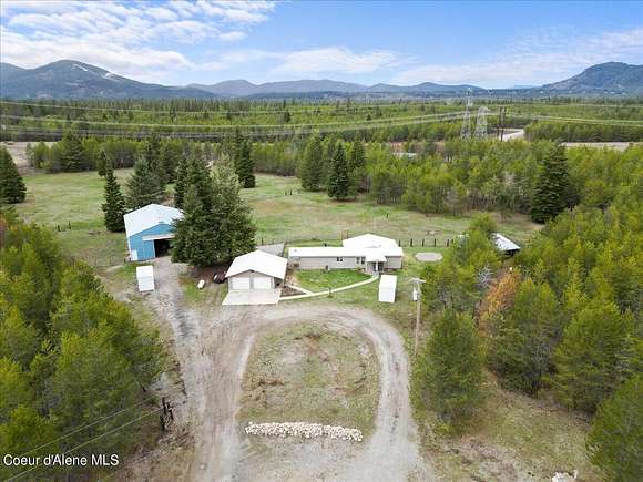 9.8 Acres of Residential Land with Home for Sale in Rathdrum, Idaho