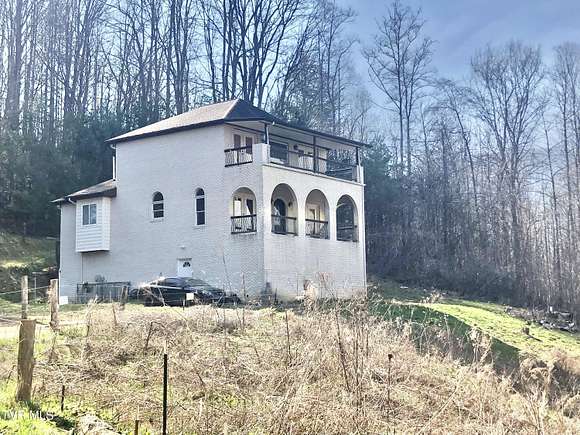 5.2 Acres of Residential Land with Home for Sale in Unicoi, Tennessee