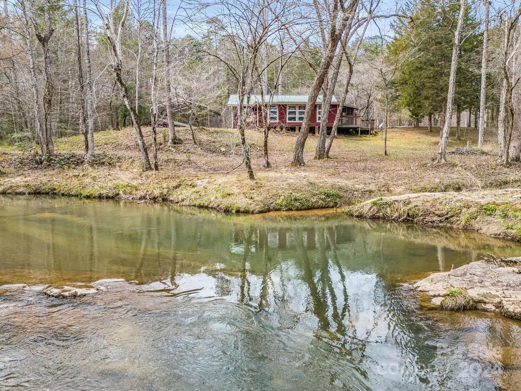 2.5 Acres of Residential Land with Home for Sale in Lake Lure, North Carolina