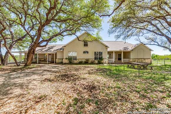 10 Acres of Land with Home for Sale in Floresville, Texas