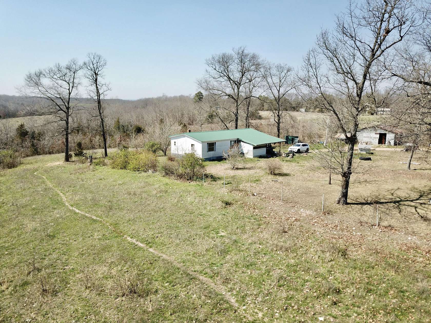 39.5 Acres of Agricultural Land with Home for Sale in Norwood, Missouri