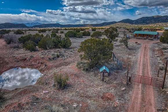 118 Acres of Agricultural Land with Home for Sale in Penrose, Colorado