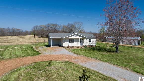 30.8 Acres of Land with Home for Sale in Almo, Kentucky