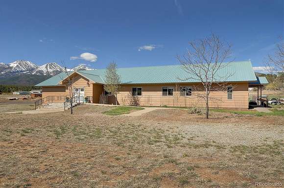 6.4 Acres of Residential Land with Home for Sale in Howard, Colorado