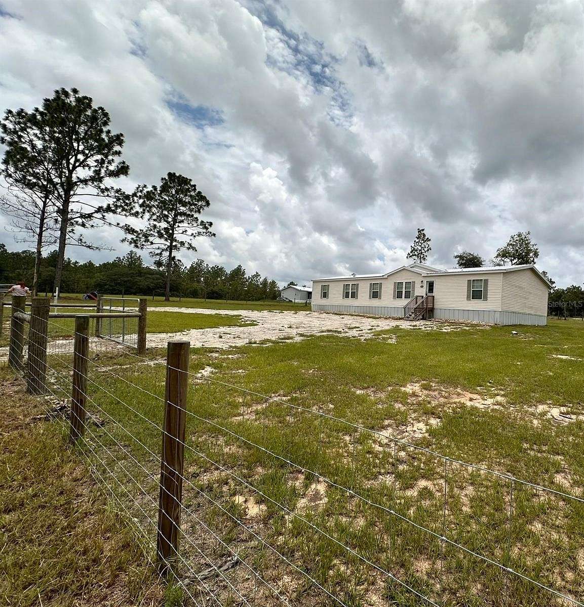 2 Acres of Residential Land with Home for Sale in Williston, Florida