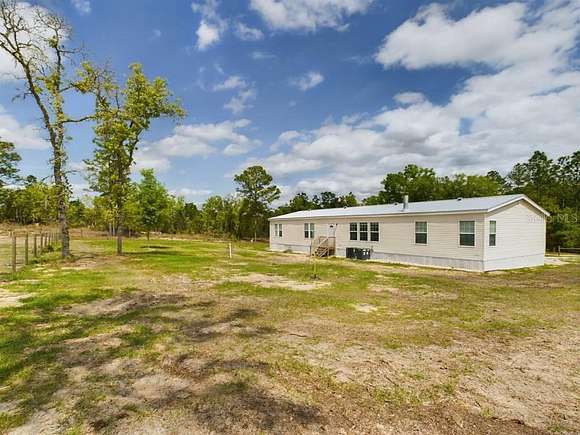 2 Acres of Residential Land with Home for Sale in Williston, Florida