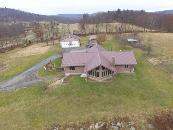 42 Acres of Recreational Land with Home for Sale in Harding, Pennsylvania