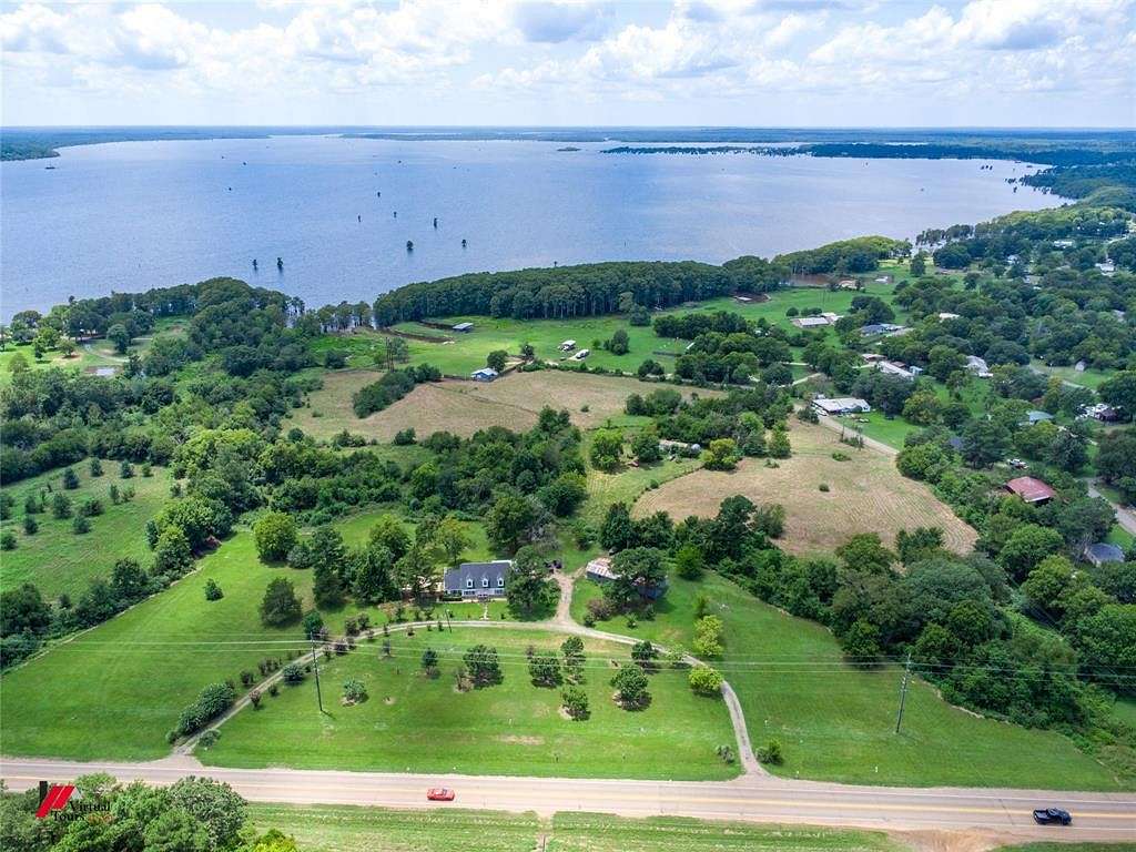 15.967 Acres of Land with Home for Sale in Oil City, Louisiana