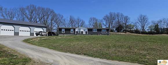 6.3 Acres of Residential Land with Home for Sale in Russell Springs, Kentucky