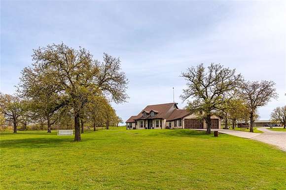 22.3 Acres of Agricultural Land with Home for Sale in Poolville, Texas