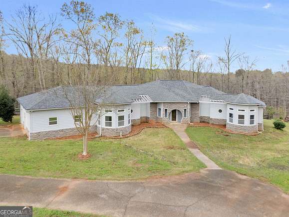 14.2 Acres of Land with Home for Sale in McDonough, Georgia
