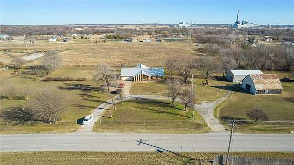 12.2 Acres of Land with Home for Sale in Oologah, Oklahoma