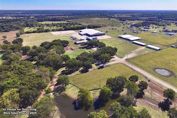 30.5 Acres of Agricultural Land with Home for Sale in Aubrey, Texas