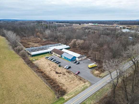 12.9 Acres of Improved Mixed-Use Land for Sale in Penfield, New York
