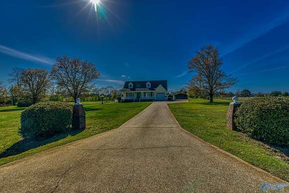 10 Acres of Recreational Land with Home for Sale in Florence, Alabama