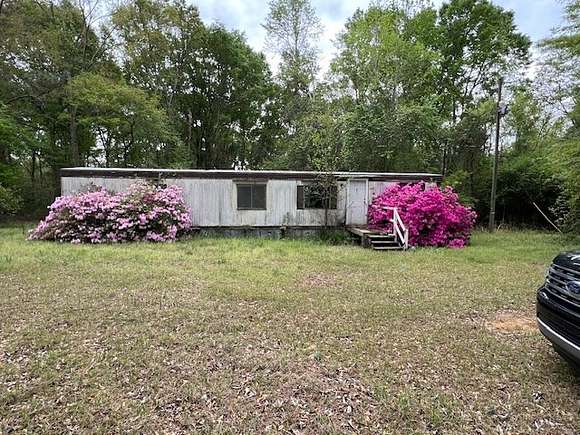 3 Acres of Land with Home for Sale in Highland Home, Alabama