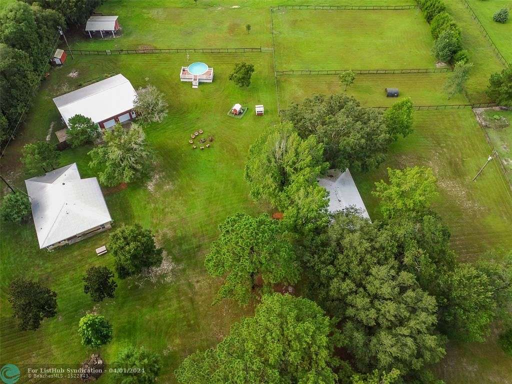 9.4 Acres of Residential Land with Home for Sale in Williston, Florida