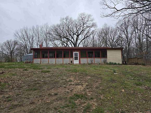 5.3 Acres of Residential Land with Home for Sale in Edwards, Missouri