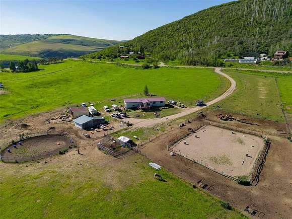 9.4 Acres of Residential Land with Home for Sale in Steamboat Springs, Colorado