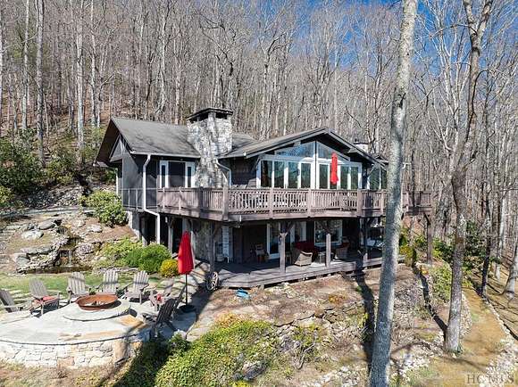 11.2 Acres of Land with Home for Sale in Scaly Mountain, North Carolina