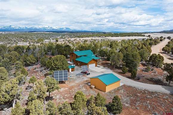 68.9 Acres of Recreational Land with Home for Sale in Hesperus, Colorado