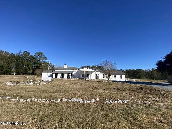 6.4 Acres of Residential Land with Home for Sale in Gulfport, Mississippi