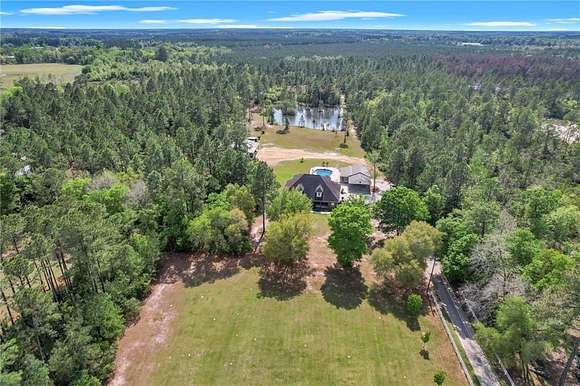 13.06 Acres of Recreational Land with Home for Sale in Jesup, Georgia