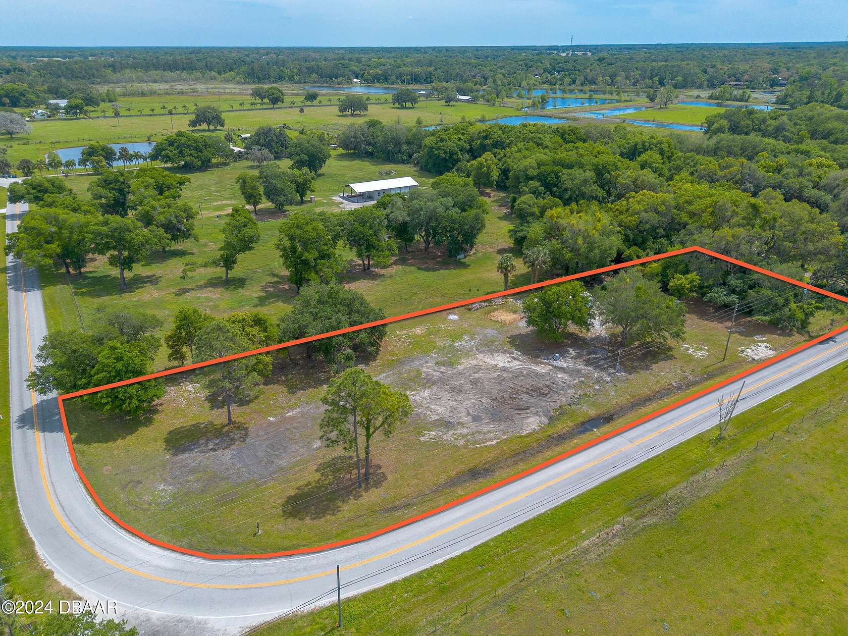 2.68 Acres of Residential Land for Sale in De Leon Springs, Florida