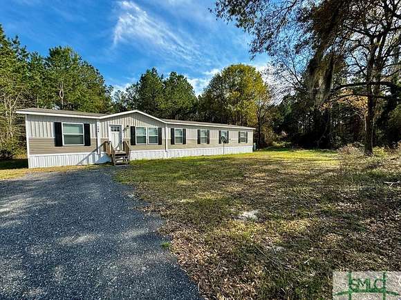 5 Acres of Residential Land with Home for Sale in Ludowici, Georgia