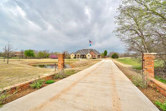 5 Acres of Residential Land with Home for Sale in Cashion, Oklahoma