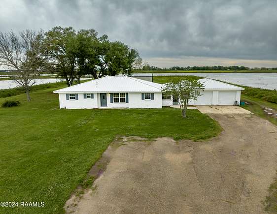 25.4 Acres of Agricultural Land with Home for Sale in Rayne, Louisiana