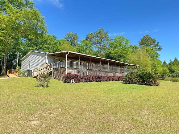 30.2 Acres of Land with Home for Sale in Pansey, Alabama
